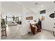 Inviting foyer with bench seating, tile flooring, and view into the open living space at 5530 Hill Spire St, Las Vegas, NV 89166
