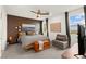 Bedroom features a stylish accent wall and large windows for natural light at 5530 Hill Spire St, Las Vegas, NV 89166