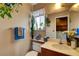 Bathroom features a toilet, sink, and storage cabinets at 5731 Fonchester Ct, Las Vegas, NV 89110