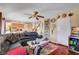 Open living room with hardwood floors; connects to kitchen and dining areas at 5731 Fonchester Ct, Las Vegas, NV 89110