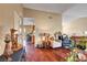 Open-concept living room with hardwood floors and neutral wall color at 5731 Fonchester Ct, Las Vegas, NV 89110