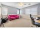 Comfortable bedroom has lots of natural light and a ceiling fan at 5769 Larkdale St, Las Vegas, NV 89120