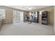 Spacious bedroom boasts lots of natural light and a ceiling fan at 5769 Larkdale St, Las Vegas, NV 89120