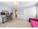 Bedroom with built in desk and closet storage at 5769 Larkdale St, Las Vegas, NV 89120