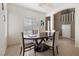 Bright dining room with a round table and chairs at 5769 Larkdale St, Las Vegas, NV 89120