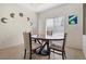 Cozy dining room features modern lighting, and stylish decor at 5769 Larkdale St, Las Vegas, NV 89120