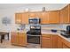 Well-equipped kitchen with stainless steel appliances, and ample cabinet space at 5769 Larkdale St, Las Vegas, NV 89120