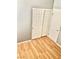 Bedroom featuring light hardwood flooring and a double door closet for storage at 6030 Halehaven Dr, Las Vegas, NV 89110