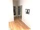 Bedroom featuring hardwood floors and closet doors at 6030 Halehaven Dr, Las Vegas, NV 89110