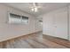 This bedroom is bright and spacious and features attractive flooring at 6205 Parsifal Pl, Las Vegas, NV 89107