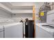 The home has a dedicated laundry room with washer and dryer at 6205 Parsifal Pl, Las Vegas, NV 89107