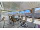 Covered patio with outdoor dining furniture and view of the yard at 6205 Parsifal Pl, Las Vegas, NV 89107
