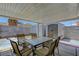Covered patio with table and chairs at 6205 Parsifal Pl, Las Vegas, NV 89107