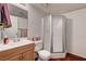 Efficient bathroom with a vanity sink, toilet, and stand-up shower at 6641 Silverstream Ave # C, Las Vegas, NV 89107