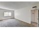 A cozy bedroom featuring carpet flooring, closet and natural light from the exterior at 6641 Silverstream Ave # C, Las Vegas, NV 89107