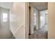 Hallway with view of staircase and bedroom entrance at 6641 Silverstream Ave # C, Las Vegas, NV 89107