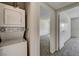 Convenient laundry area with stacked washer and dryer at 6641 Silverstream Ave # C, Las Vegas, NV 89107