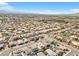 An aerial view of a large neighborhood shows a Primary-planned community at 7070 Cinder Horse St, Las Vegas, NV 89131
