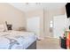 Bedroom with a ceiling fan and access to closet, bathroom and exterior at 7070 Cinder Horse St, Las Vegas, NV 89131