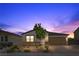 Charming single story home with desert landscaping, brick driveway, and a two car garage in a suburban neighborhood at 7070 Cinder Horse St, Las Vegas, NV 89131