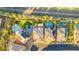 Beautiful aerial view of homes with pools, basketball courts, and solar panels at 724 Step Beach St, Las Vegas, NV 89138