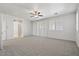 Spacious bedroom with shuttered windows and neutral carpet at 724 Step Beach St, Las Vegas, NV 89138