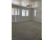 Bright and airy bedroom with neutral carpet, lots of light and shuttered windows at 724 Step Beach St, Las Vegas, NV 89138
