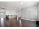 Second-floor hallway with hard wood floors and decorative textured wall finish at 724 Step Beach St, Las Vegas, NV 89138