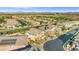 An elevated view showing a residential street and well-maintained homes in a desert landscape at 724 Step Beach St, Las Vegas, NV 89138