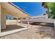 Covered patio and low maintenance backyard, perfect for outdoor living and entertaining at 7927 W Oquendo Rd, Las Vegas, NV 89113