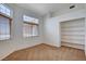 Bright bedroom with ample natural light and built-in shelving at 7927 W Oquendo Rd, Las Vegas, NV 89113