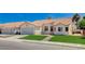 Charming single-story home with a well-maintained front lawn, desert landscaping, and a two-car garage at 7927 W Oquendo Rd, Las Vegas, NV 89113