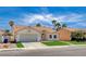 Charming single-story home with a well-maintained front lawn, desert landscaping, and a two-car garage at 7927 W Oquendo Rd, Las Vegas, NV 89113