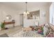 Cozy dining area with natural light, playful decor, and an open view into the kitchen and living areas at 8136 Shady Glen Ave, Las Vegas, NV 89131