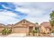 Charming single-story home with well-maintained landscaping, a two-car garage, and a welcoming entrance at 8136 Shady Glen Ave, Las Vegas, NV 89131