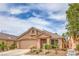 Charming single-story home with a well-maintained front yard, desert landscaping, and a two-car garage at 8136 Shady Glen Ave, Las Vegas, NV 89131