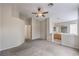 Large main bedroom with neutral tones, carpet, and ensuite bathroom area with double sinks at 8136 Shady Glen Ave, Las Vegas, NV 89131