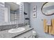 Charming bathroom with granite countertop and framed mirrors at 8216 Brittany Harbor Dr, Las Vegas, NV 89128