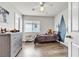 Charming bedroom with a mountain mural and wood-look flooring at 8216 Brittany Harbor Dr, Las Vegas, NV 89128