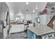 A kitchen with stainless steel appliances, granite countertops, and an island with bar stool seating at 8216 Brittany Harbor Dr, Las Vegas, NV 89128