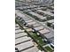 An aerial view of a neighborhood with neat yards and community landscaping at 8724 Scalpay St, Las Vegas, NV 89166