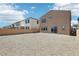 A large backyard provides ample space for outdoor living, backing up to neighbors on either side at 8724 Scalpay St, Las Vegas, NV 89166