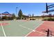 Community full-sized basketball court featuring two hoops and a covered seating area at 8724 Scalpay St, Las Vegas, NV 89166