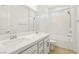 This gorgeous bathroom includes a double sink vanity and a separate shower and bathtub at 8724 Scalpay St, Las Vegas, NV 89166