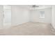 Bright bedroom featuring neutral carpeting and natural light from the window at 8724 Scalpay St, Las Vegas, NV 89166