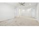 Large bedroom with neutral carpet and white trim, offering ample space at 8724 Scalpay St, Las Vegas, NV 89166