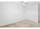 A carpeted bedroom with a closet, offers ample space and storage, creating a versatile area at 8724 Scalpay St, Las Vegas, NV 89166