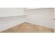 Walk-in closet featuring carpet flooring and shelving at 8724 Scalpay St, Las Vegas, NV 89166