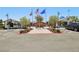 Attractive community center entrance featuring flags and a paved walkway at 8724 Scalpay St, Las Vegas, NV 89166