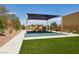 Neighborhood playground with play structure, artificial turf and a shade at 8724 Scalpay St, Las Vegas, NV 89166